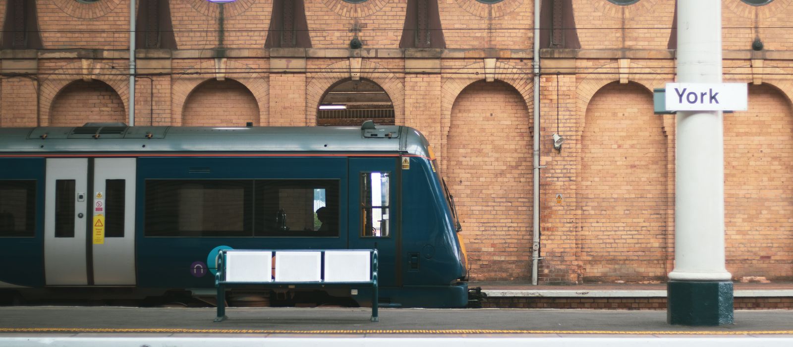 A modern train at York Station, showcasing heritage architecture. Perfect blend of new and old.