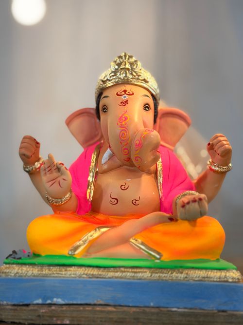 Free Colorful Hindu Ganesh idol with intricate designs, symbolizing wisdom and prosperity in Indian culture. Stock Photo