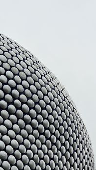 Close-up of the iconic Bullring Shopping Centre façade in Birmingham, showcasing modern architecture.