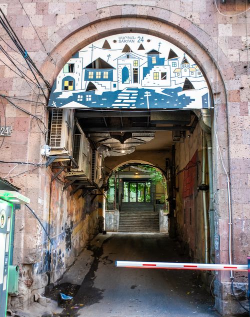 Free An intricately painted archway entrance on Saryan street in Yerevan with artistic urban design. Stock Photo