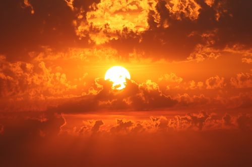 Free Captivating sunset with vibrant colors over clouds in Nieuwpoort, Belgium. Stock Photo