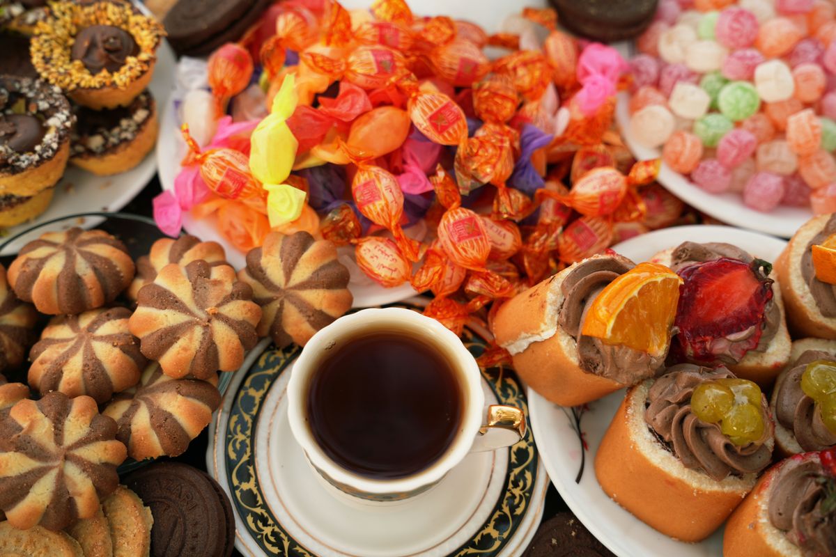 A delightful array of Persian sweets and tea, perfect for a traditional afternoon treat.