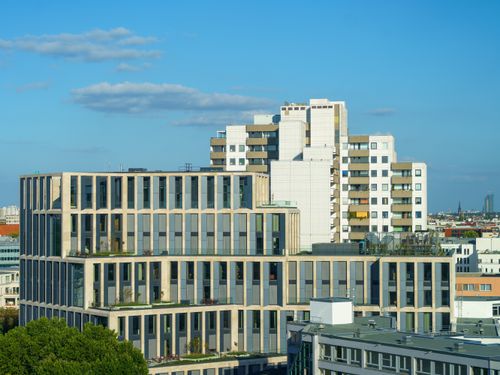 Free Contemporary buildings showcasing modern architecture with geometric shapes in an urban setting. Stock Photo
