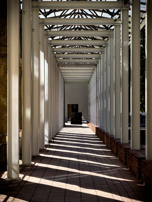 Free Sunlit modern corridor in Munich creates intriguing light patterns. Stock Photo