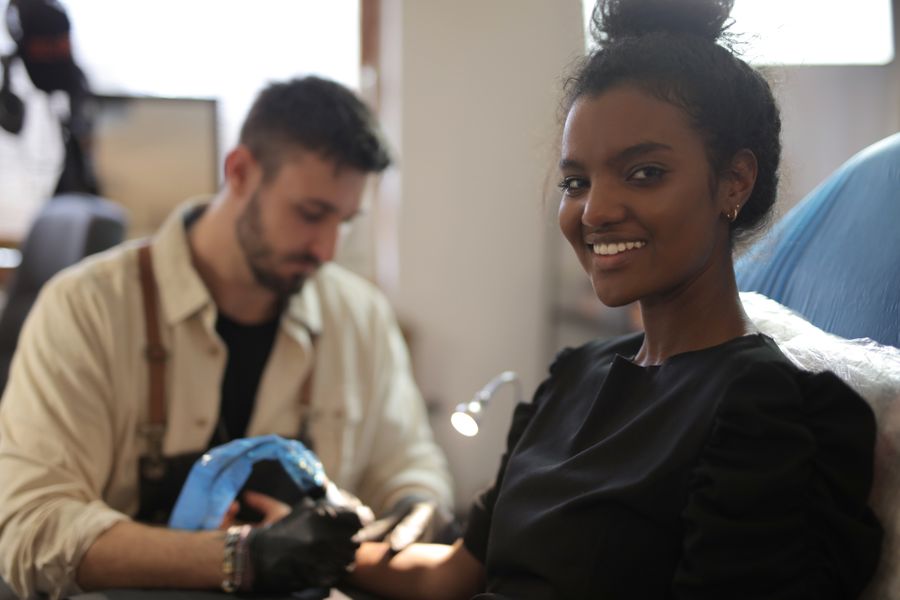 Smiling client mid-session in the studio