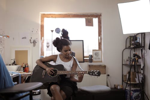 Woman Playing Guitar