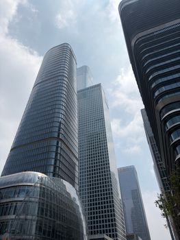 Skyline of Beijing with modern skyscrapers under a clear sky, showcasing urban architecture.