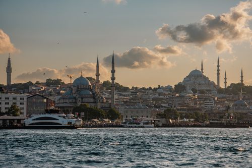 Free Beautiful view of Istanbul skyline featuring historic mosques during sunset over the Bosphorus. Stock Photo