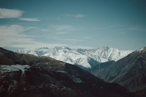 Free Marvel at the breathtaking snow-covered peaks of the Caucasus Mountains in Chechnya, Russia. Stock Photo