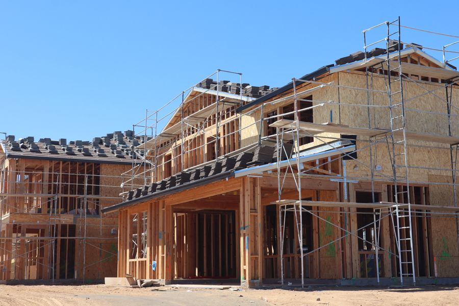 New residential homes under construction with scaffolding