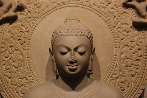 A Gray Concrete Buddha Statue