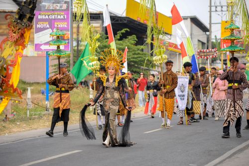 Free Colorful parade showcasing traditional attire in a lively cultural festival. Stock Photo
