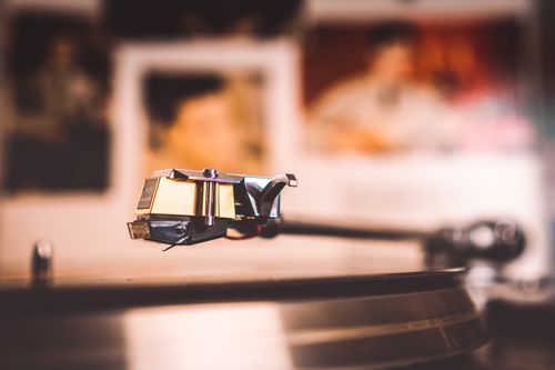 Free Close-up shot of a vintage vinyl record player needle with blurred background, emphasizing nostalgia. Stock Photo