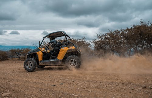 Man on quad bike riding off road