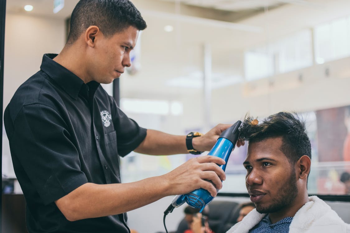 Man Getting His Hair Done · Free Stock Photo