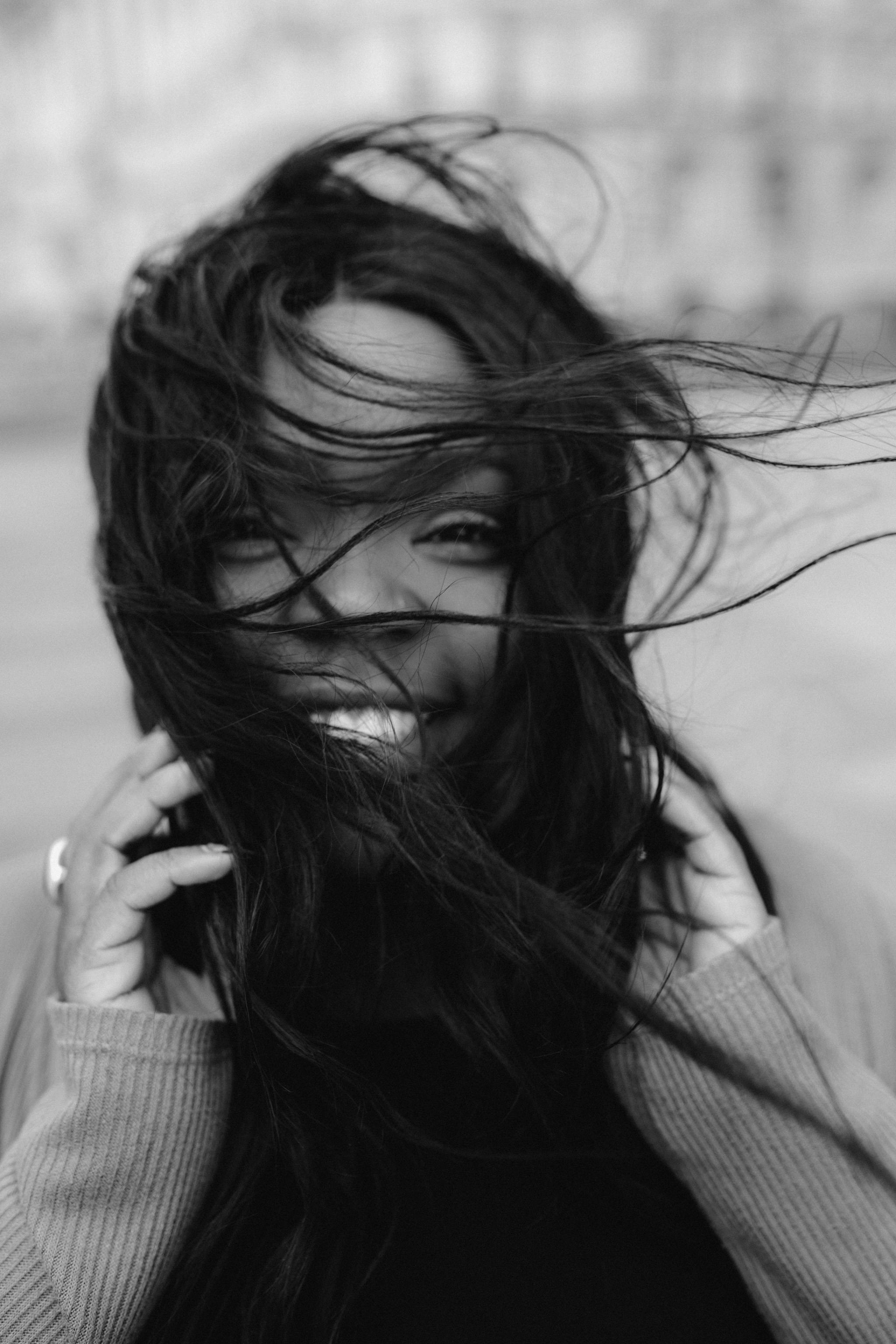 monochrome photo of woman smiling