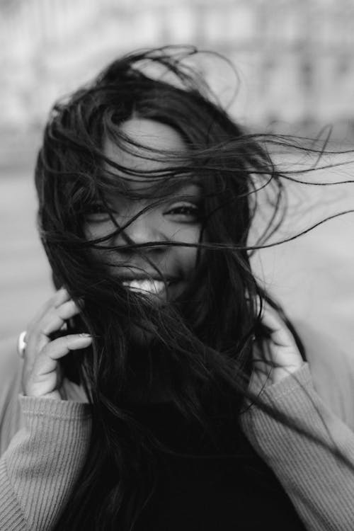 Monochrome Photo of Woman Smiling