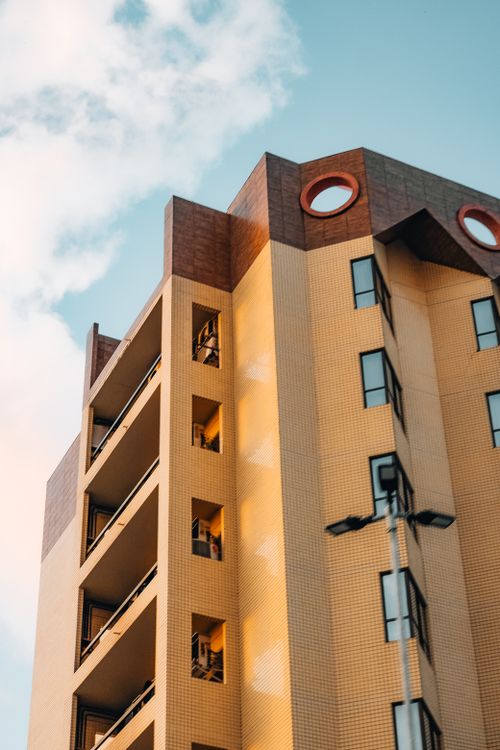 Free A modern architectural building in Natal, Brazil, captured with golden hour lighting. Stock Photo