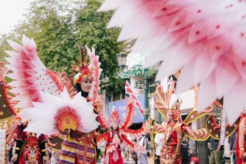 Free Colorful cultural parade in Yogyakarta with performers in intricate traditional costumes. Stock Photo