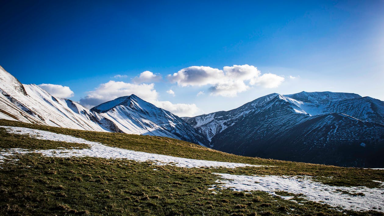 Snow-covered Mountains Under Blue Clear Sky