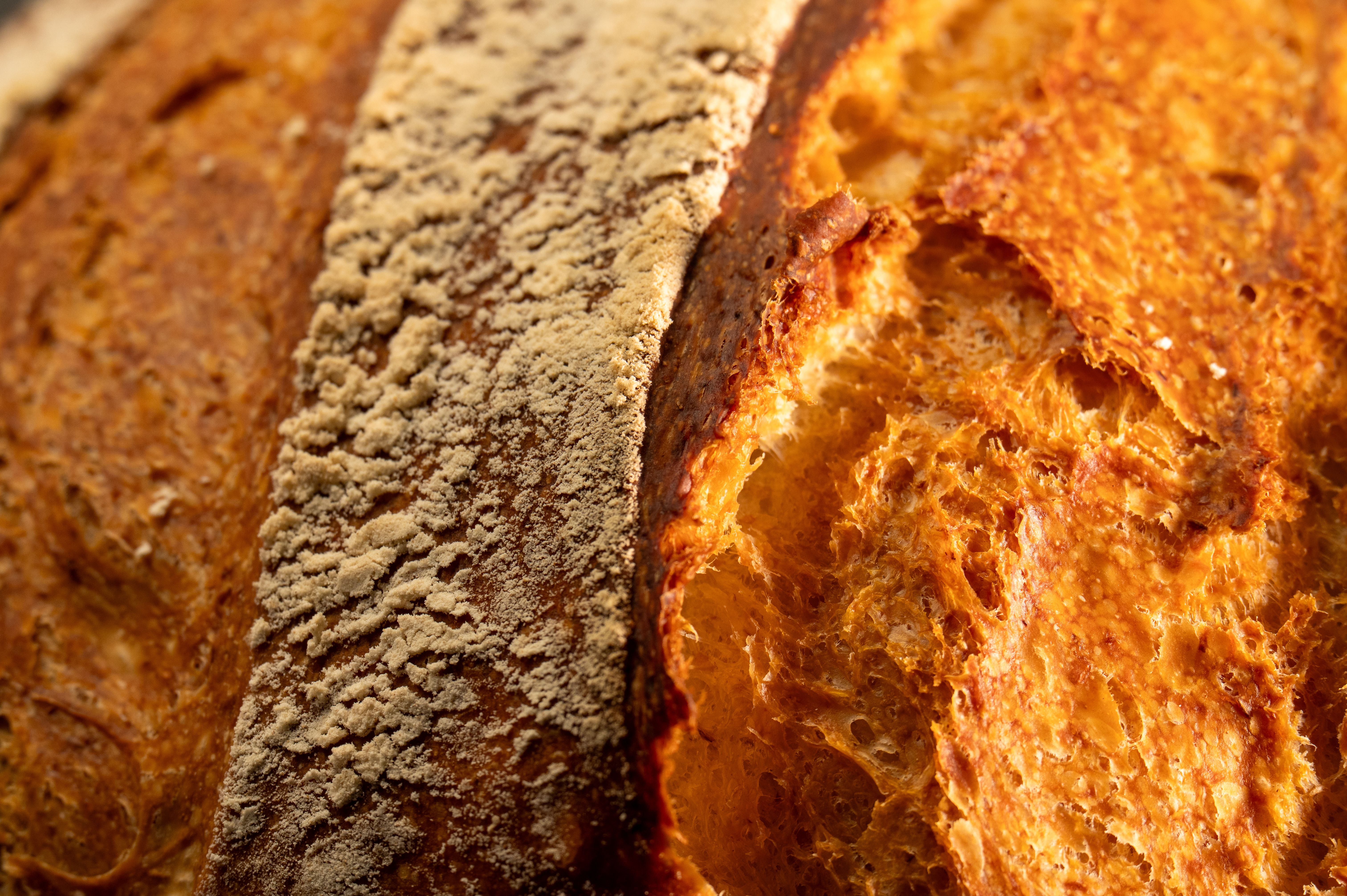 Fresh sourdough loaf on bakery shelf