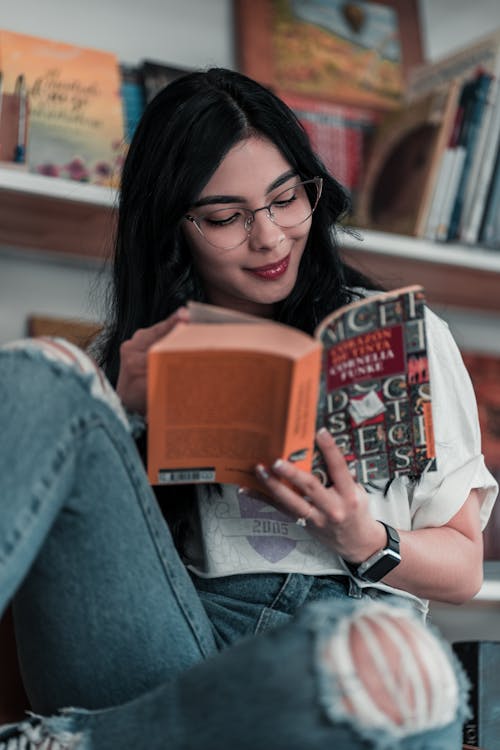 Photo Of Woman Reading Book 