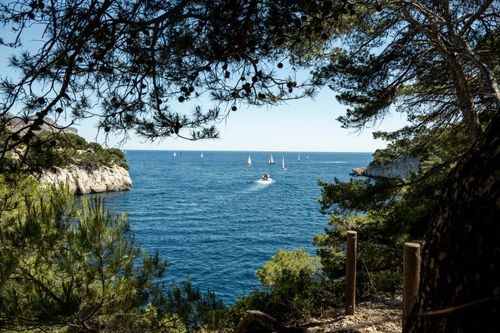 Free Scenic view of the Mediterranean coast with sailboats in Provence, France. Stock Photo