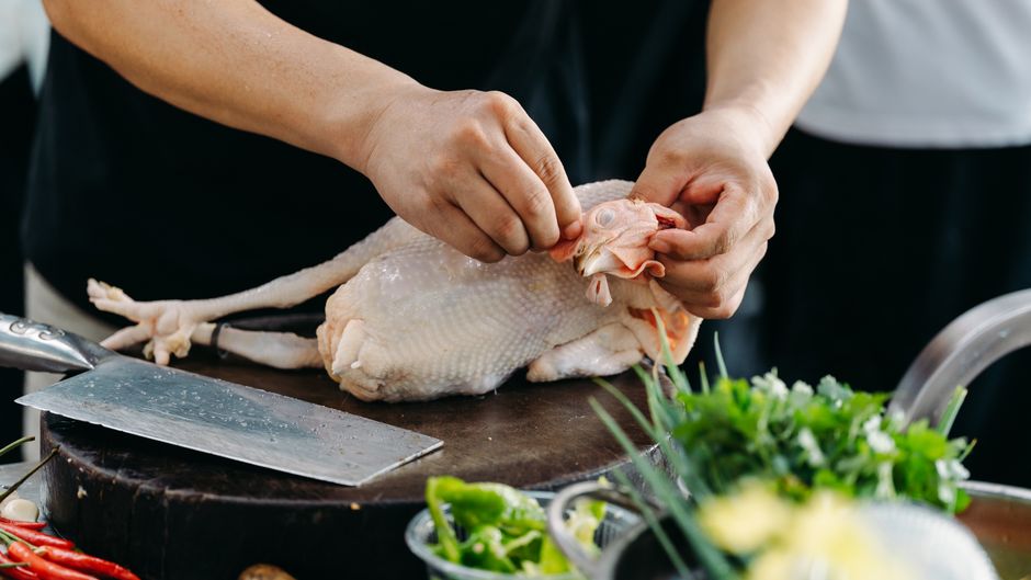 Photo by Blackcurrant Great on Pexels Woman meal prepping chicken and vegetables in a Dover kitchen