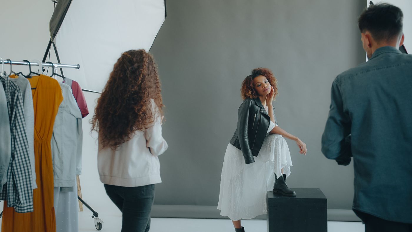 Stylists and a model on a fashion shoot in the Diary studio