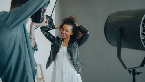 Free A joyful model posing during a professional indoor photo session. Stock Photo