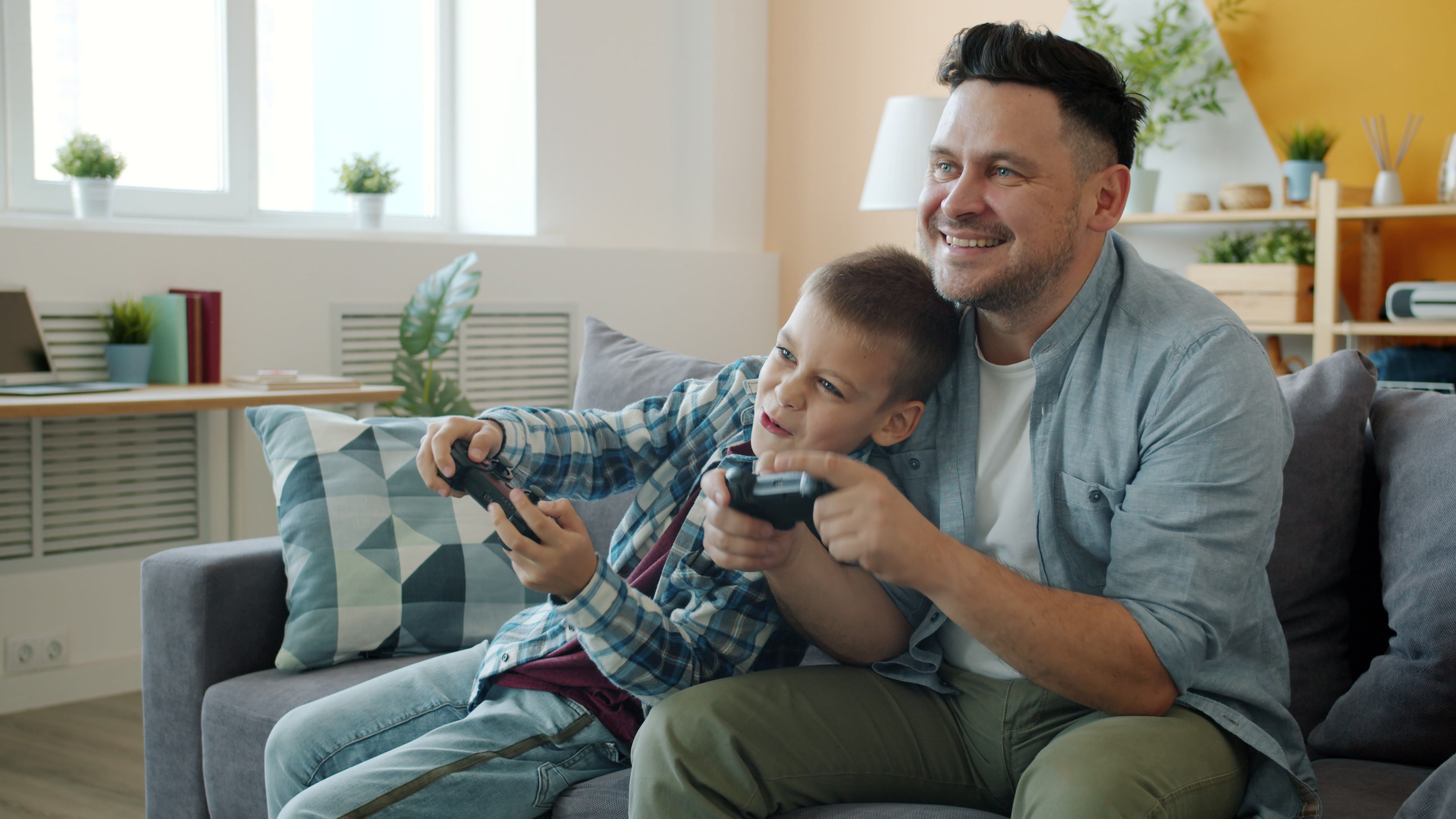 Father and son enjoying video games together