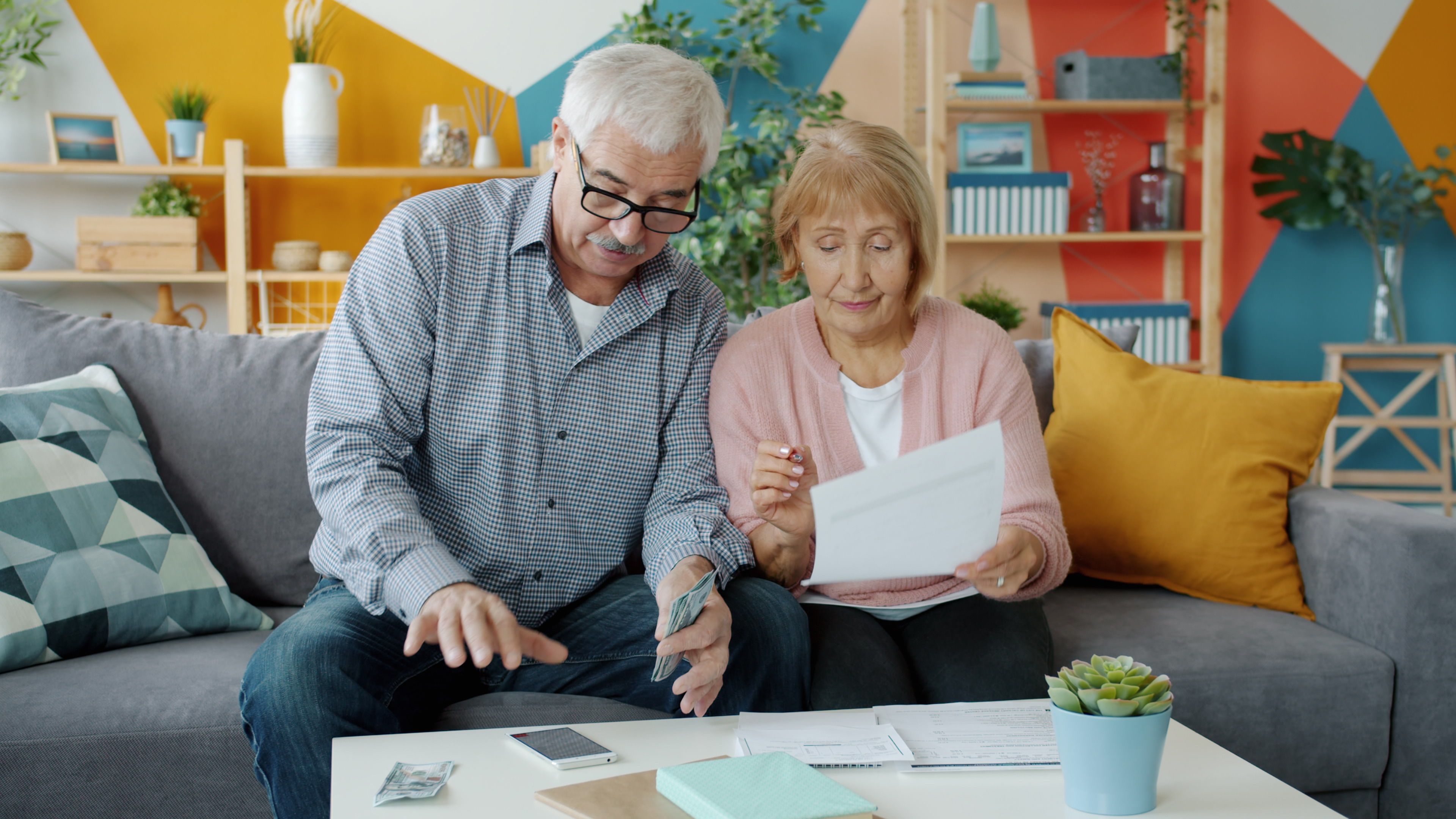 senior couple reviewing finances