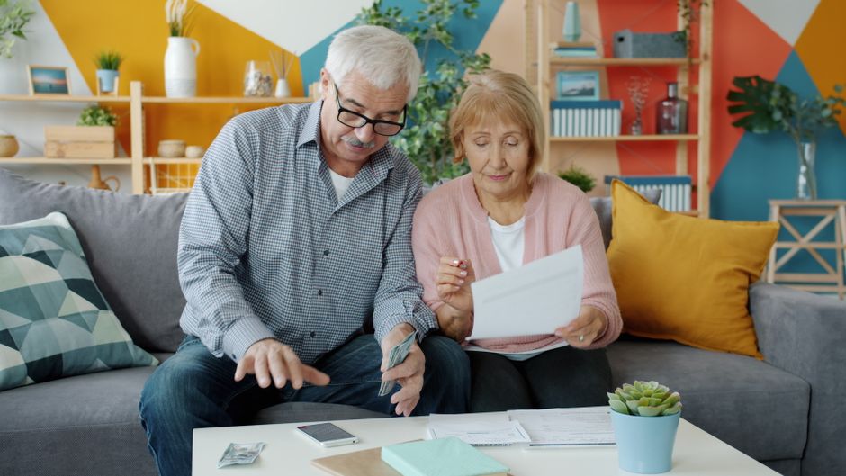 senior couple reviewing finances