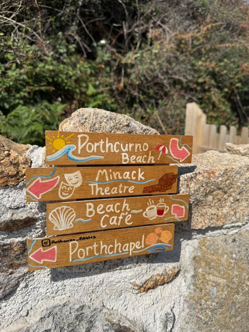 Free Rustic wooden signs point to Porthcurno Beach and Minack Theatre. Stock Photo