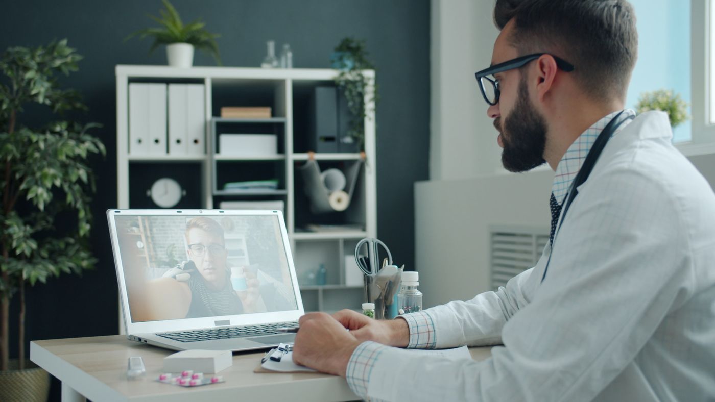 Doctor greeting a patient on a video call