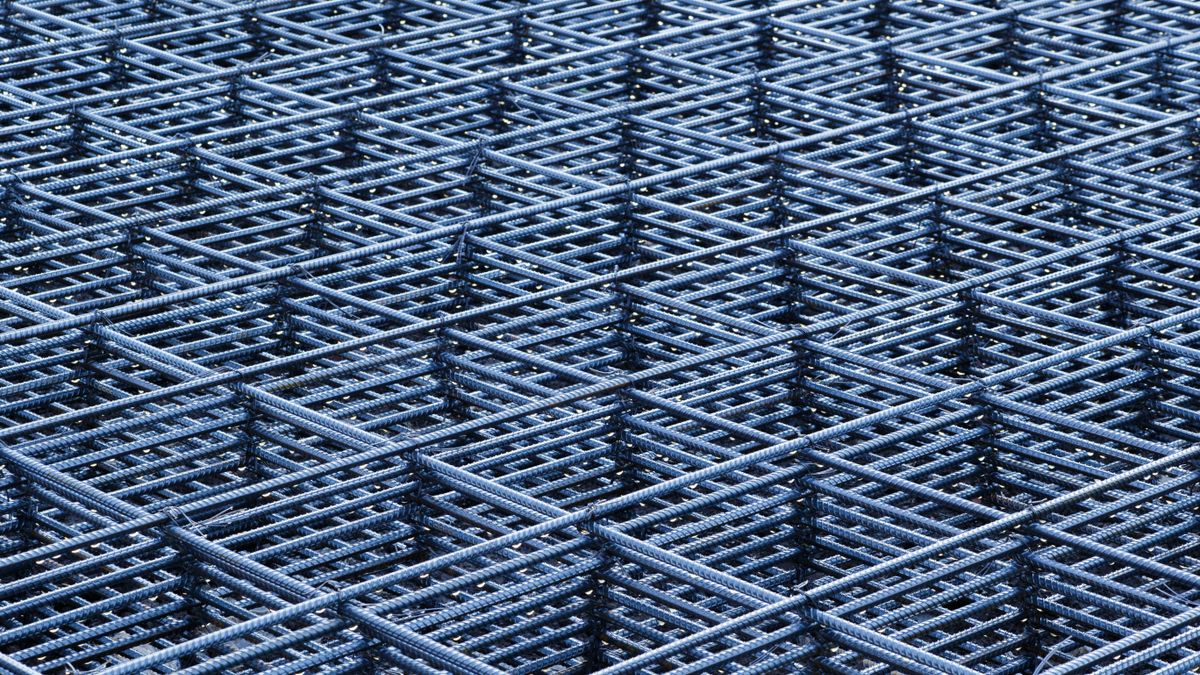 A close-up of a steel rebar grid. The bar number is its diameter in eighths of an inch.