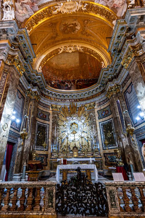 Free Intricate Baroque style altar in a historic Rome church with gold details. Stock Photo