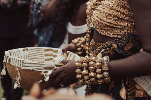 Free A close-up view of a traditional African ceremony showcasing intricate jewelry and cultural attire. Stock Photo