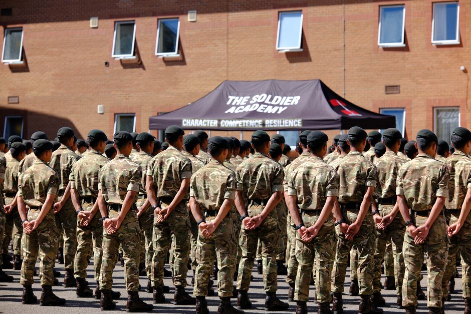Gurkha soldiers in the British Army stand in formation at a training academy in England.