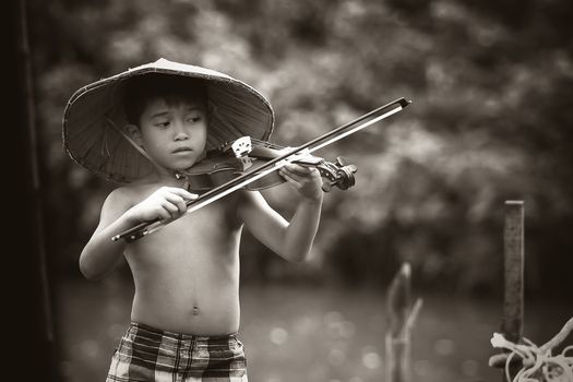 Grayscale Photography of Boy Playing Violin