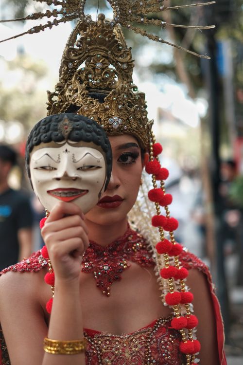 Free Indonesian dancer in traditional costume holding a mask, in Bandung. Stock Photo