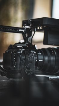 Detailed shot of professional camera setup, perfect for capturing video or photography with style.