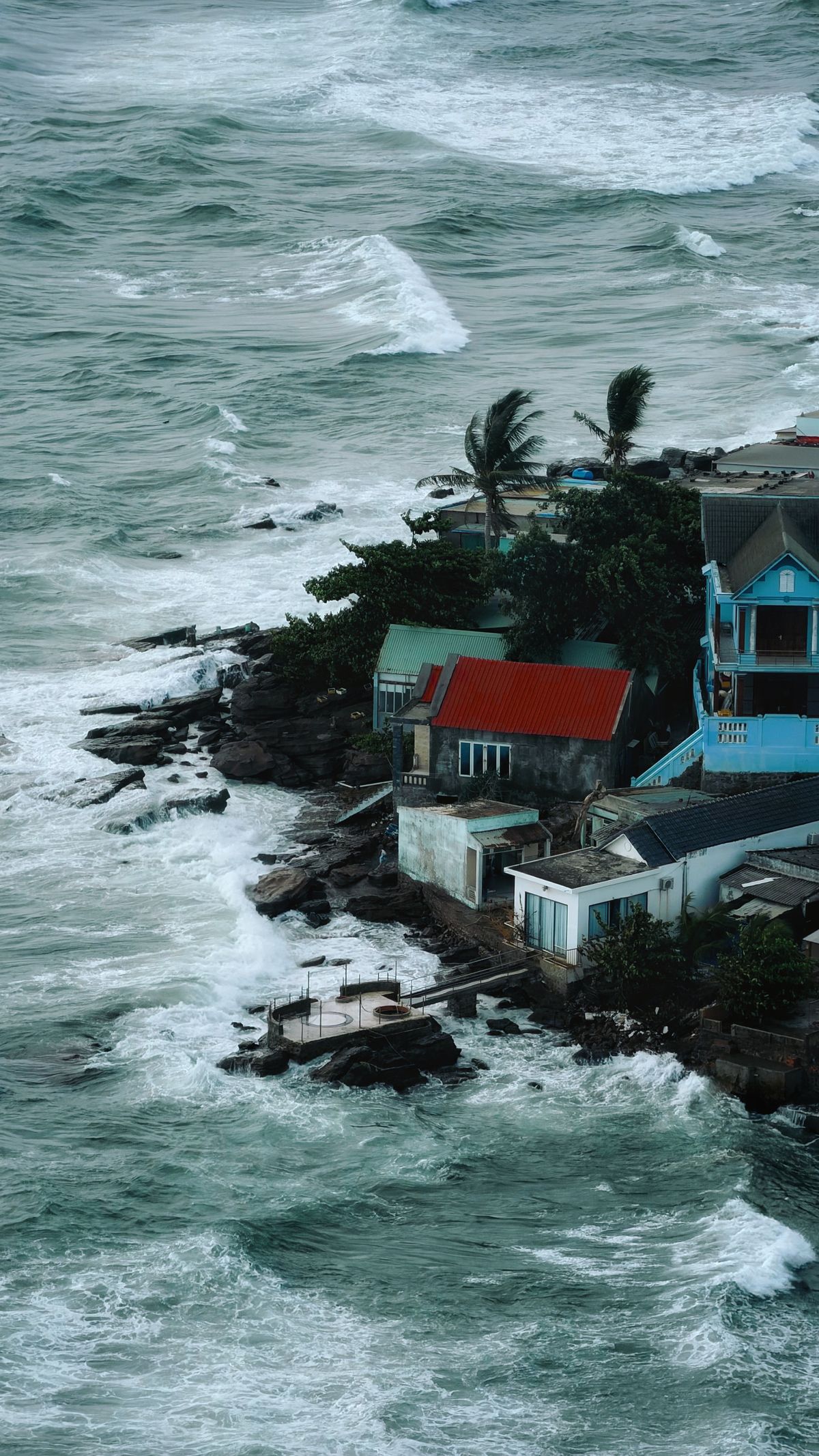 Waves breaking along a rocky stretch of Phu Quoc coastline