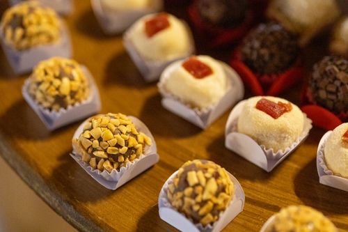 Free Close-up of assorted sweet brigadeiros with different toppings, perfect for celebrations. Stock Photo