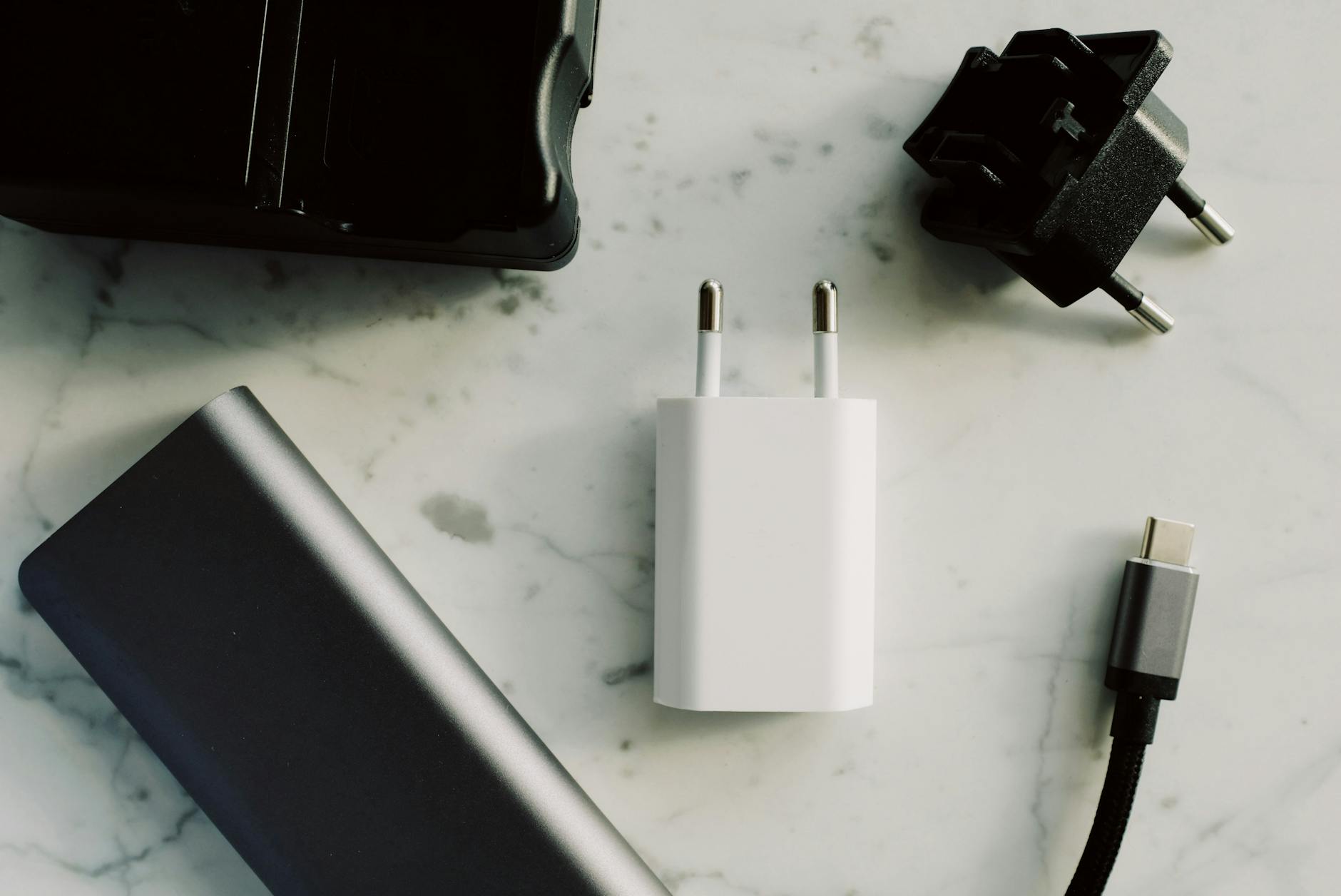 Adapters On White Surface