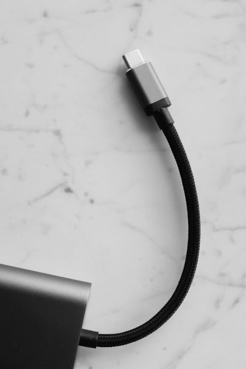 Free Usb-C Cable On White Surface Stock Photo