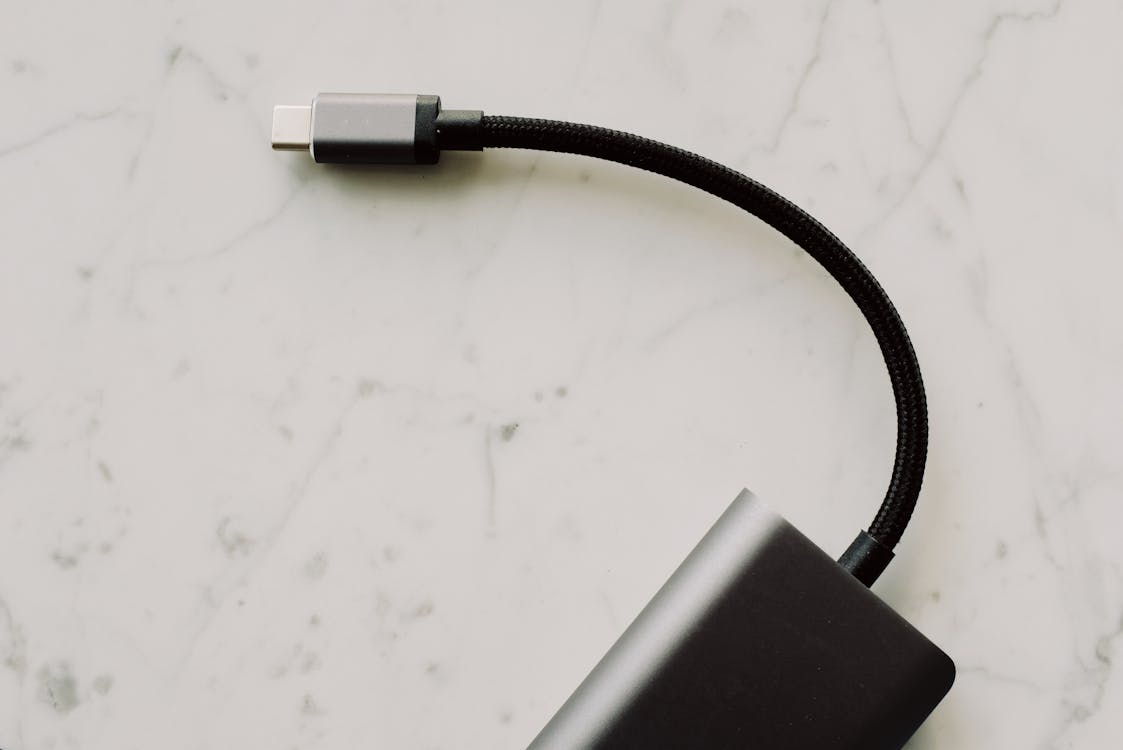 Free Usb-C Cable On White Surface Stock Photo