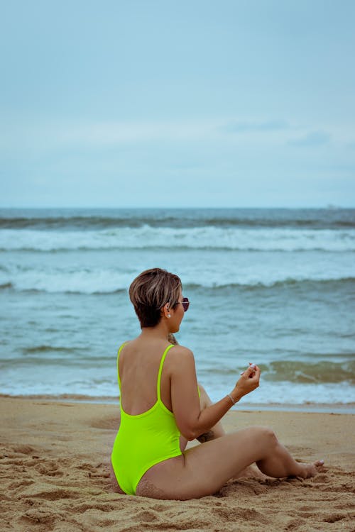 Photo of Woman In Green Swimsuit