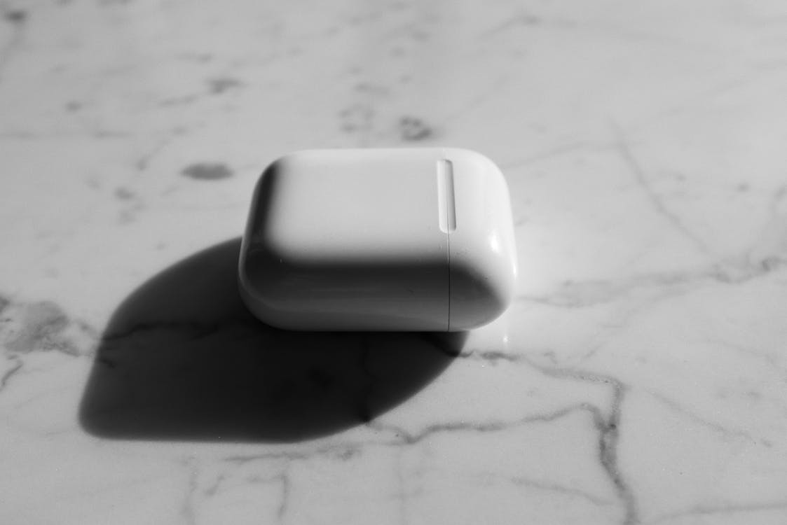 Monochrome Photo of Airpods Casing