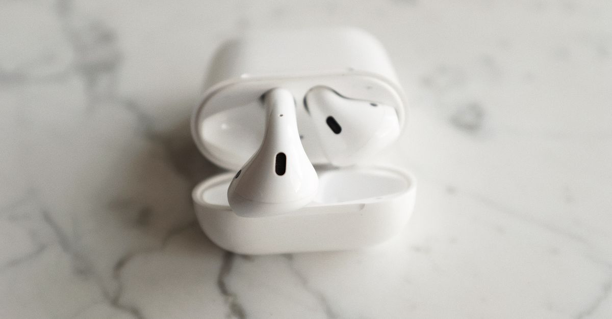 Plaud One AI earbuds charging case
